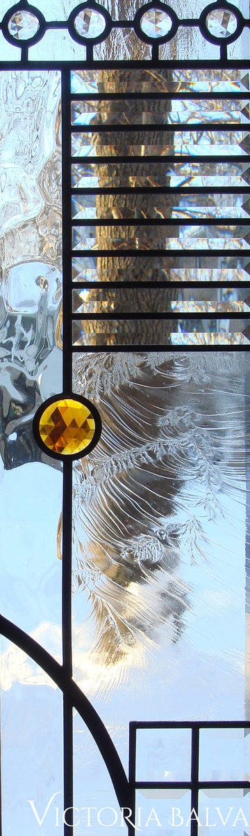 Contemporary style leaded glassdetail with jewels and beveled glass