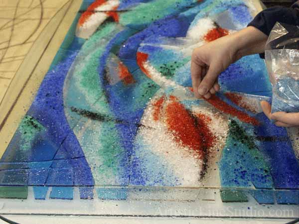 Stained, fused and leaded glass suspended panel in progress before fusing