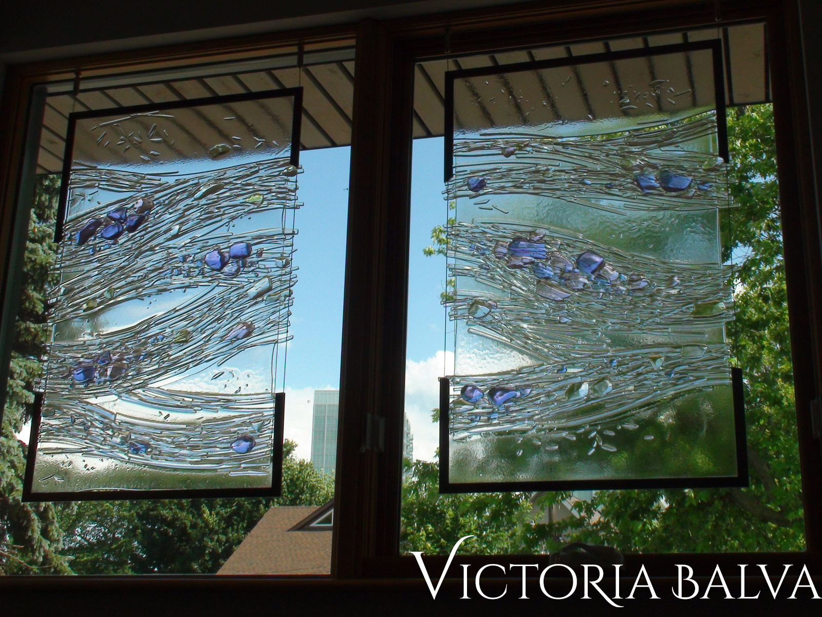 Modern kilnformed fused glass panels for the foyer window of a private residence 