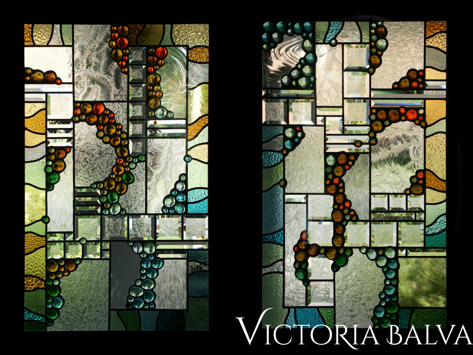 Stained and leaded glass enrance door light detail with colored nuggets and beveled glass