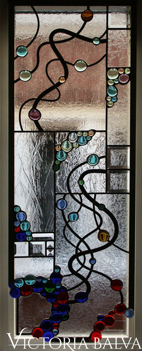 Abstract style stained, beveled and leaded glass free shape suspended panels with nuggets and beveled glass