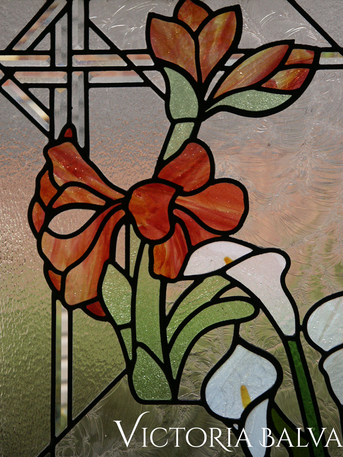 Stained leaded glass window. Flower garden. Amoralis, Tulips, Lilias. Window detail